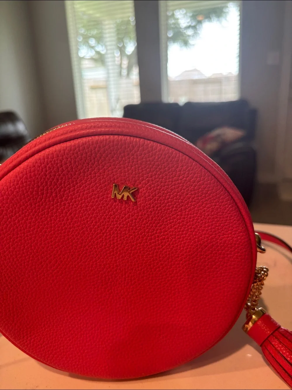 NWOT Michael Kors Coral Pink Round Crossbody Bag with Tassel